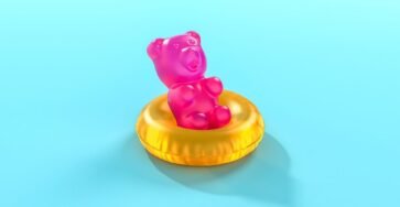 Image showing a gummy in a tub signifying "Can You Fly with Delta 9 Gummies"