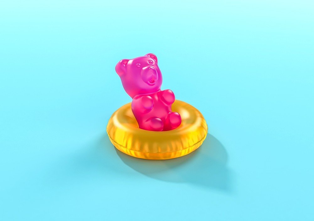 Image showing a gummy in a tub signifying "Can You Fly with Delta 9 Gummies"