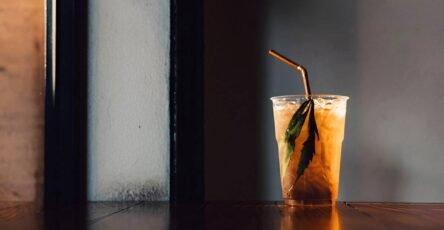 Image of a Delta-9 drink in a glass jar with a straw