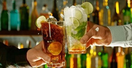 Image of a Delta 9 drink and an alcoholic beverage in 2 different glasses.